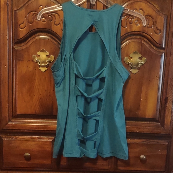 Victoria's Secret Tops - Victoria Secret Sport brand. Strappy back mesh sides. Size S.